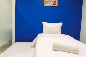 Simple Studio Room at Guest House Way Seputih near Central Park By Travelio